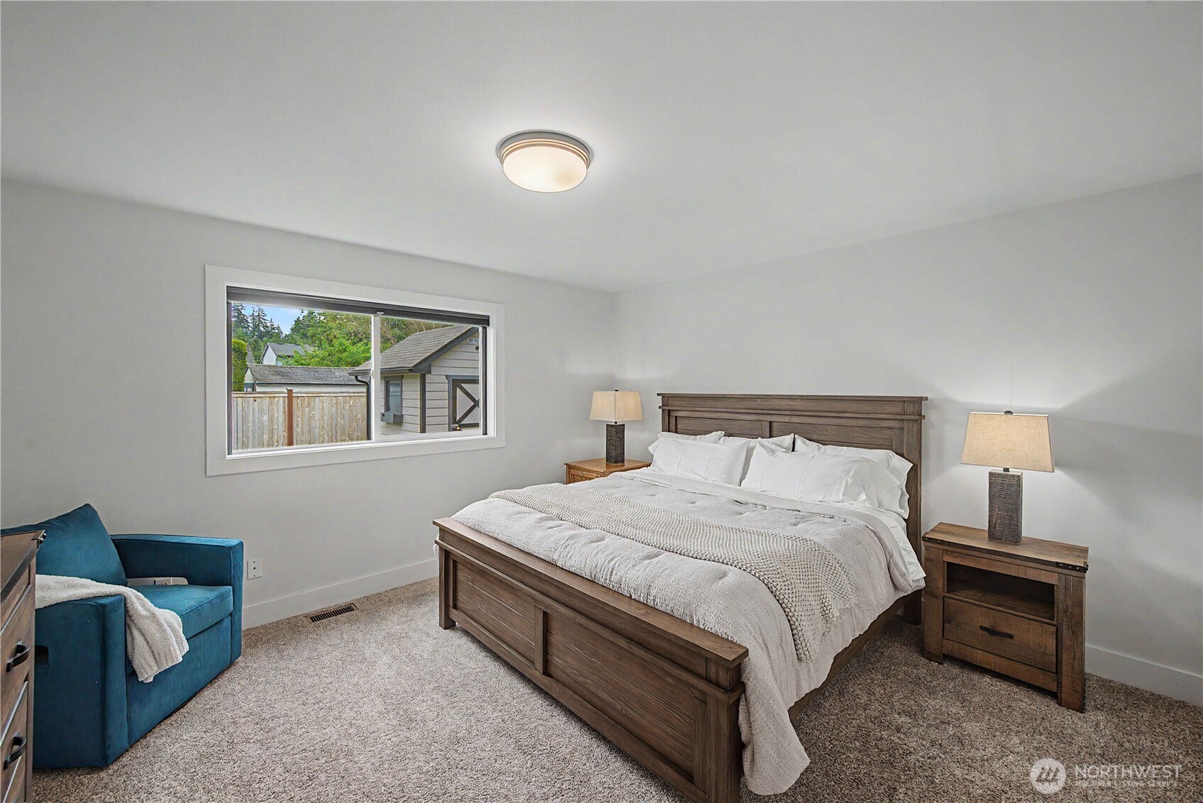20919 Ronning Road Arlington, WA 98223 - Photo 19 of 28 a bedroom with a bed and a window