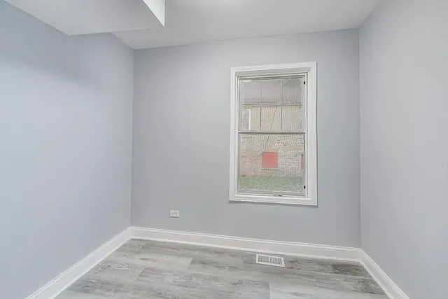 an empty room with window