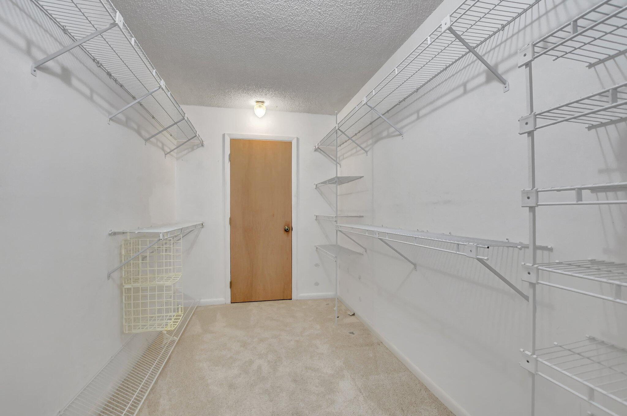 7170 Promenade Drive, Unit 702 Boca Raton, FL 33433 - Photo 31 of 45 master bedroom closet