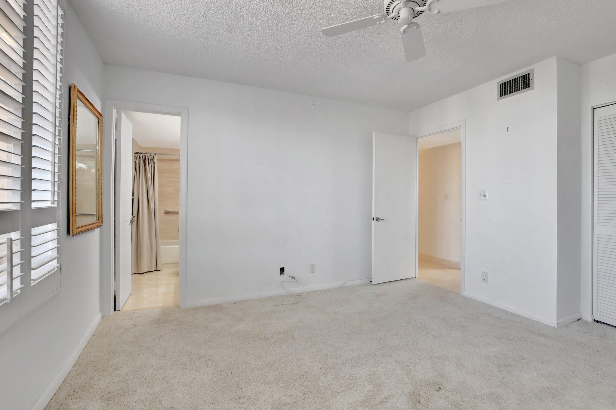 7170 Promenade Drive, Unit 702 Boca Raton, FL 33433 - Photo 33 of 45 2nd bedroom