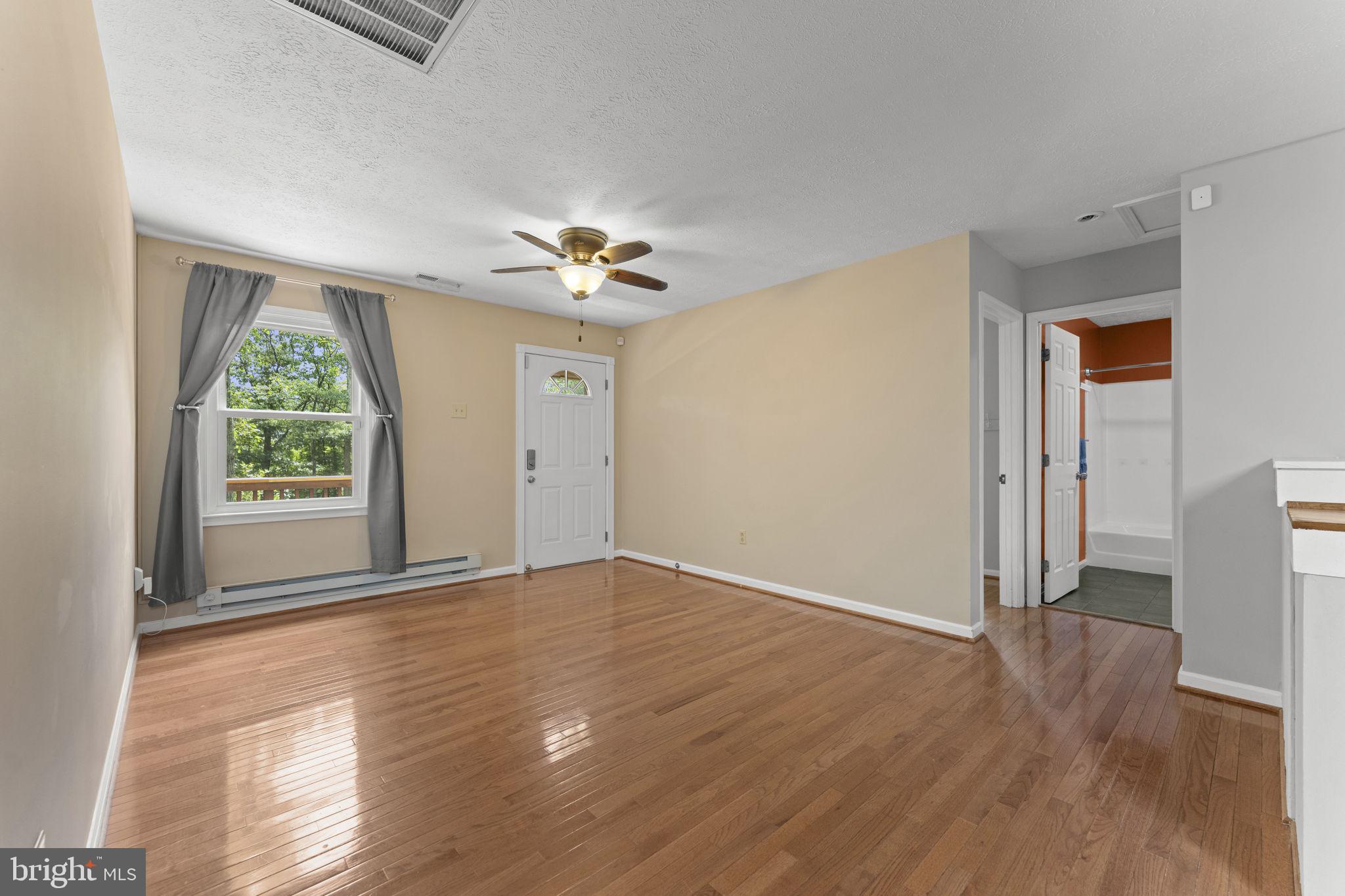 111 Geronimo Trail Winchester, VA 22602 - Photo 7 of 43 Features gleaming hardwood floors