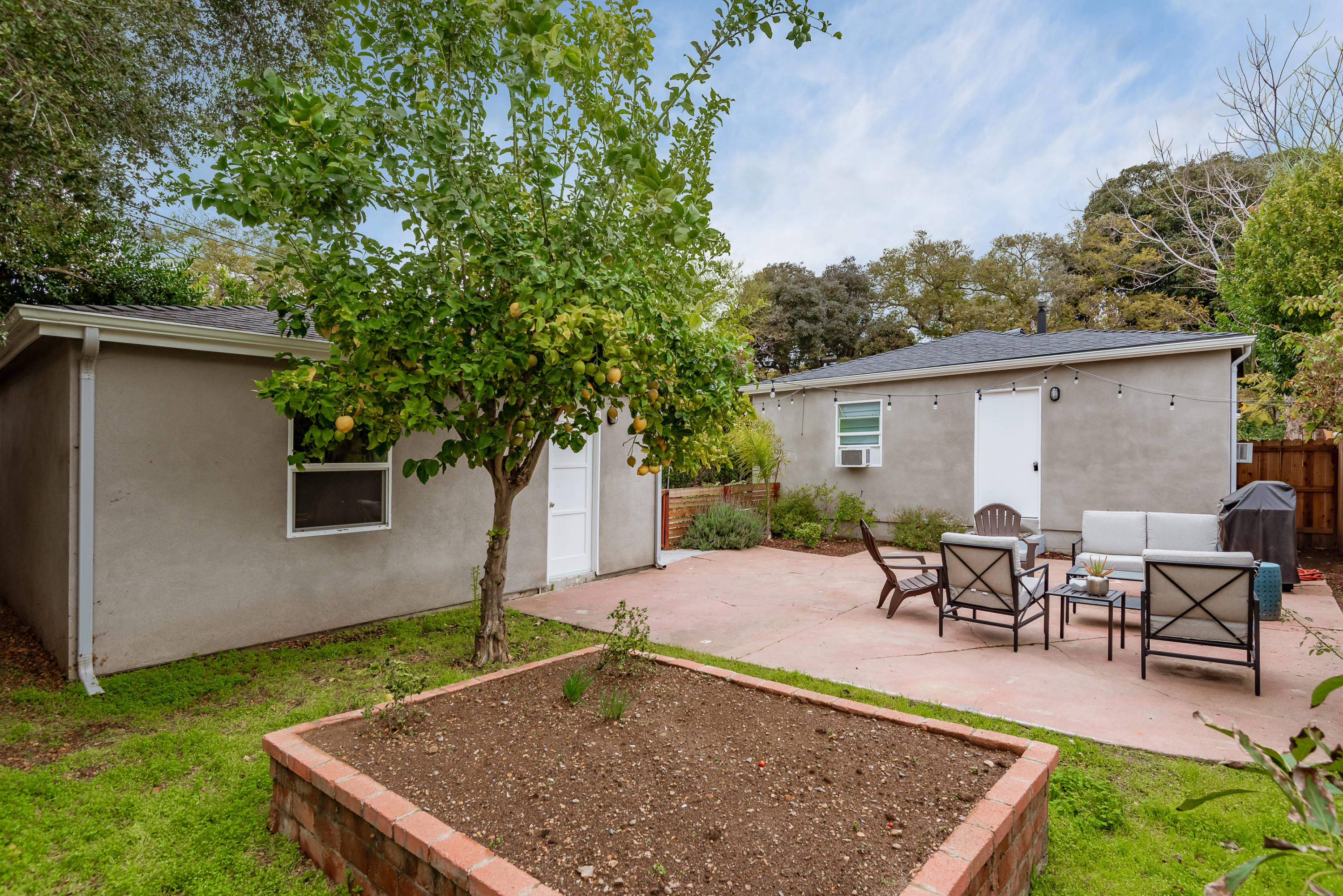 2125 Modoc Road Santa Barbara, CA 93101 - Photo 9 of 9 Backyard, patio, 2-car garage