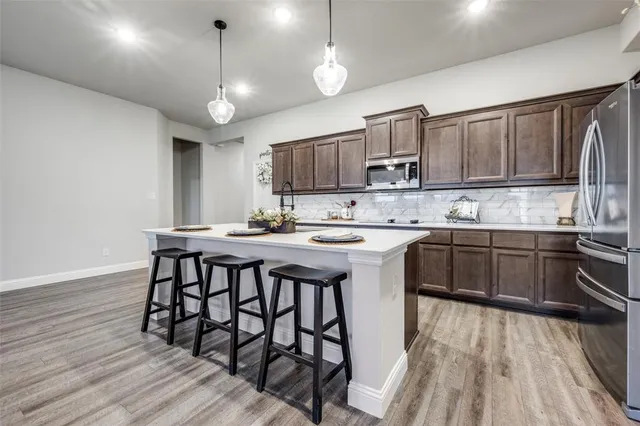 $460,000 | 623 Woodridge Drive, Oak Point, TX 75068