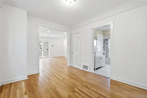 a view of wooden floor in an empty room