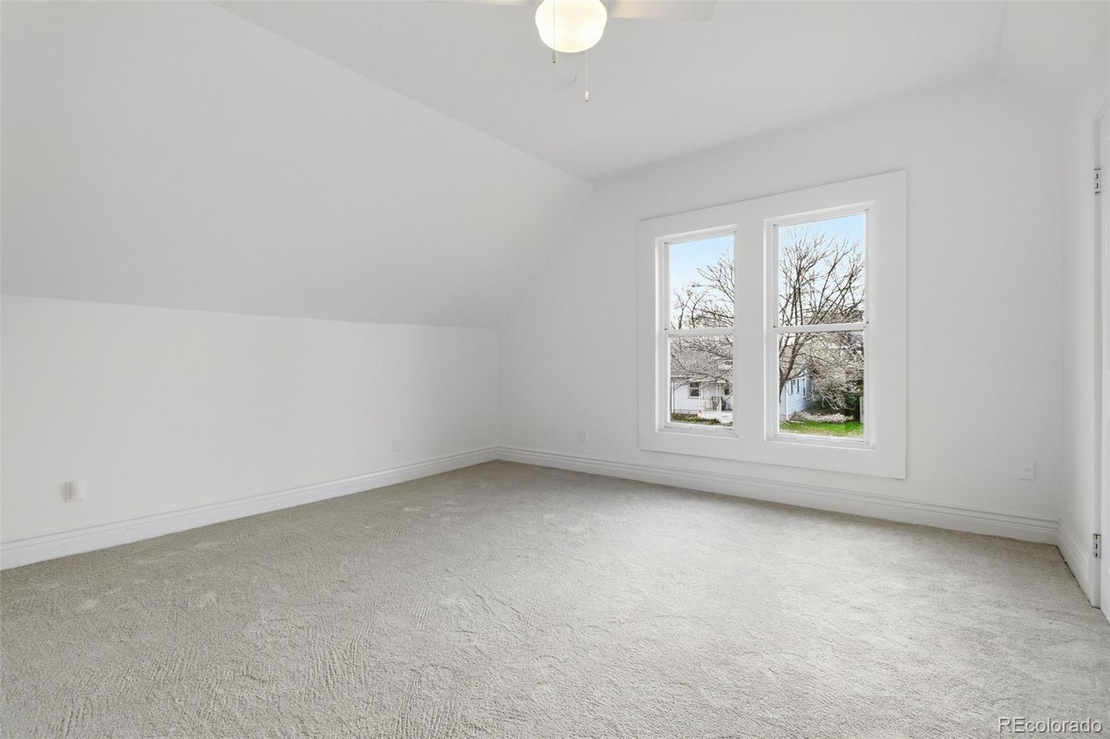 4182 Yates Street Denver, CO 80212 - Photo 25 of 48 an empty room with windows