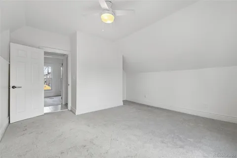 an empty room with mirror