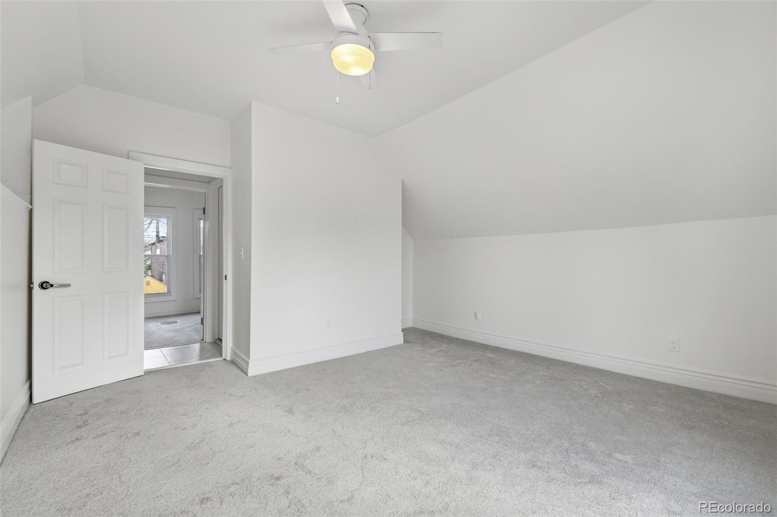 4182 Yates Street Denver, CO 80212 - Photo 26 of 48 an empty room with mirror