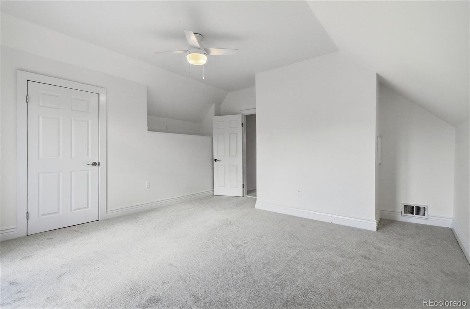 4182 Yates Street Denver, CO 80212 - Photo 27 of 48 a view of an empty room with a window