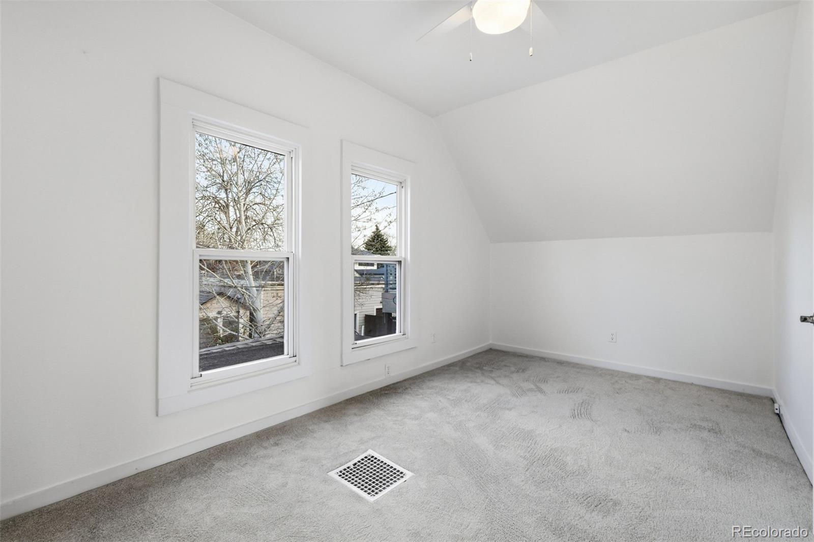 4182 Yates Street Denver, CO 80212 - Photo 32 of 48 an empty room with windows