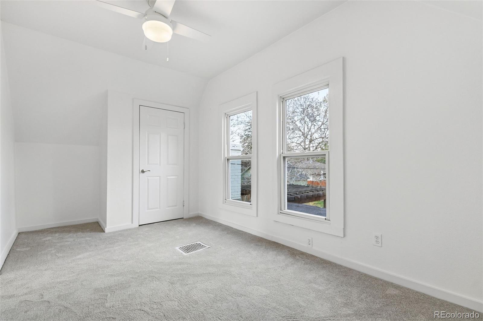 4182 Yates Street Denver, CO 80212 - Photo 34 of 48 an empty room with windows