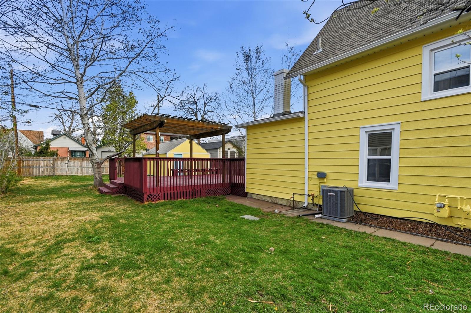 4182 Yates Street Denver, CO 80212 - Photo 46 of 48 a view of a house with a backyard