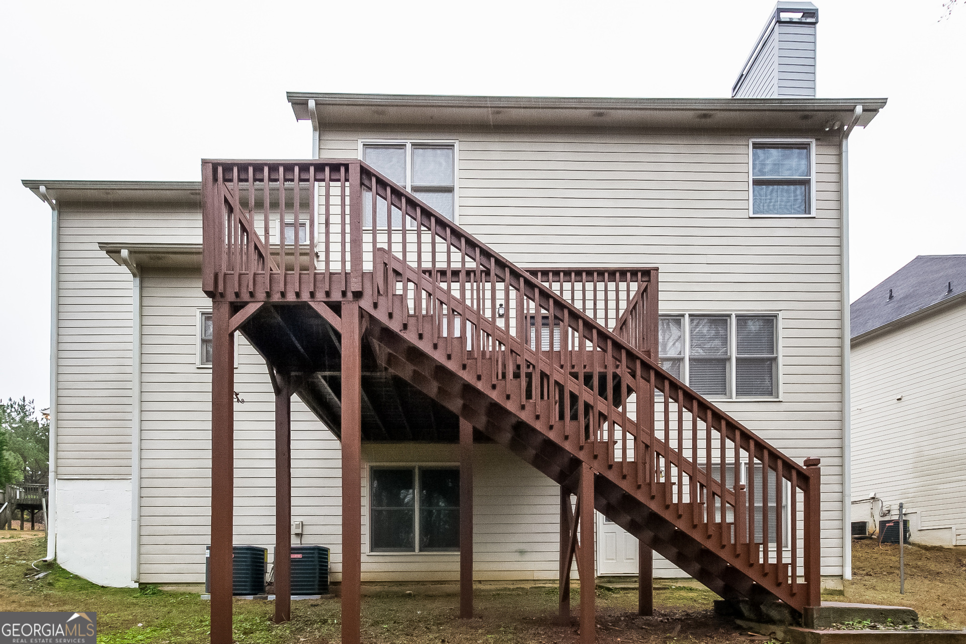 2485 Worthington Drive Powder Springs, GA 30127 - Photo 15 of 15 a view of a house with wooden stairs