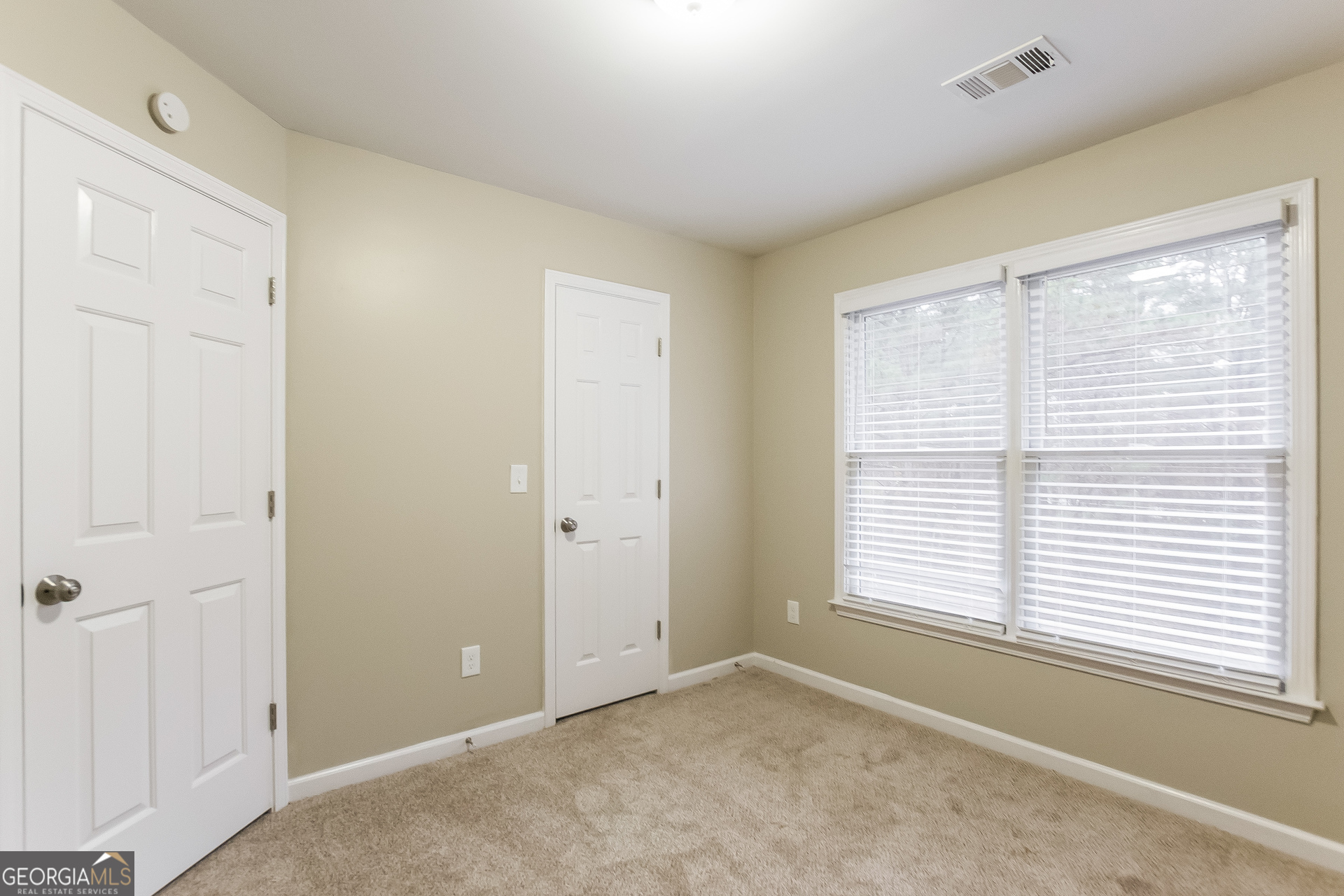 2485 Worthington Drive Powder Springs, GA 30127 - Photo 10 of 15 a view of an empty room with a window