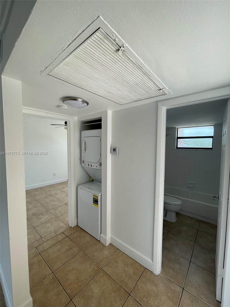 14915 Southwest 104th Street, Unit 2024 Miami, FL 33196 - Photo 13 of 34 a view of a utility room with closet