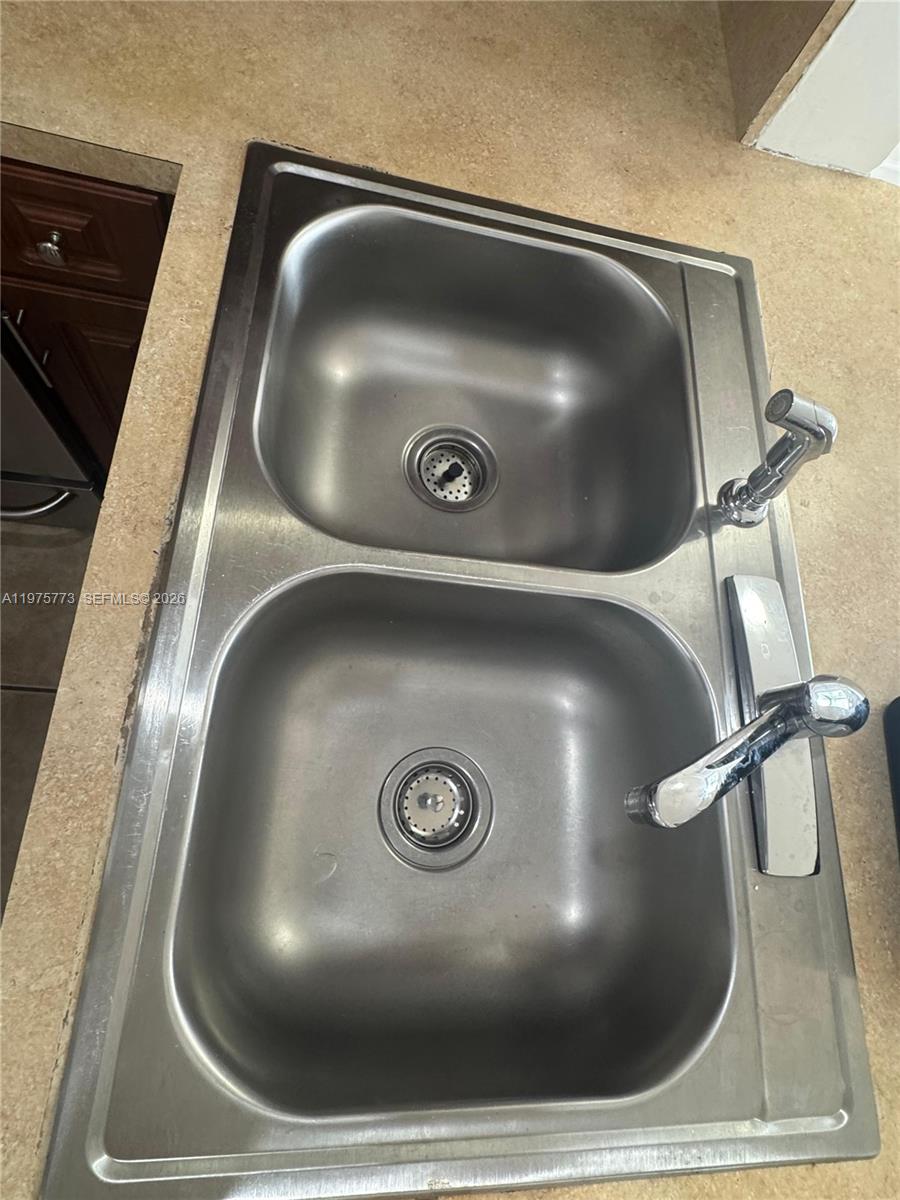 14915 Southwest 104th Street, Unit 2024 Miami, FL 33196 - Photo 31 of 34 a close view of tap