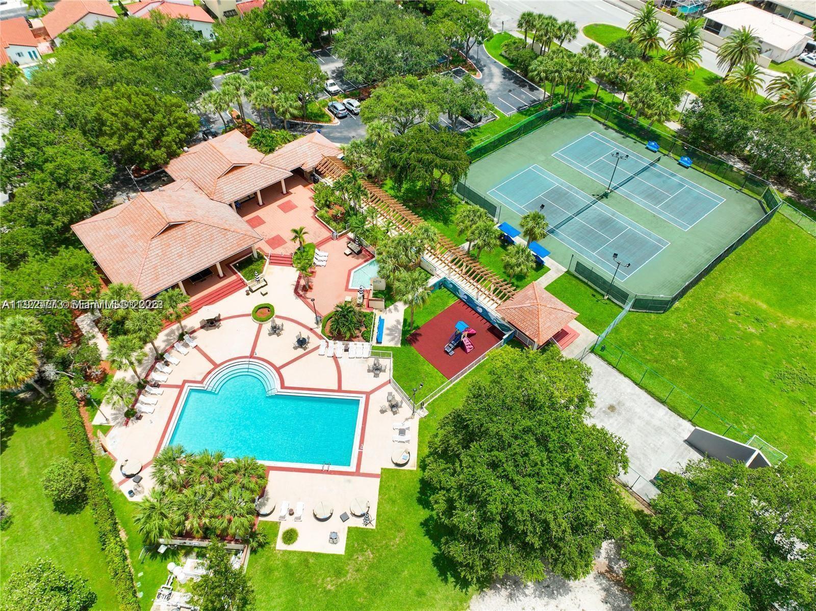 14915 Southwest 104th Street, Unit 2024 Miami, FL 33196 - Photo 33 of 34 an aerial view of a house