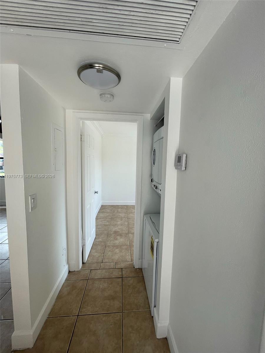14915 Southwest 104th Street, Unit 2024 Miami, FL 33196 - Photo 8 of 34 a view of a hallway with a elevator