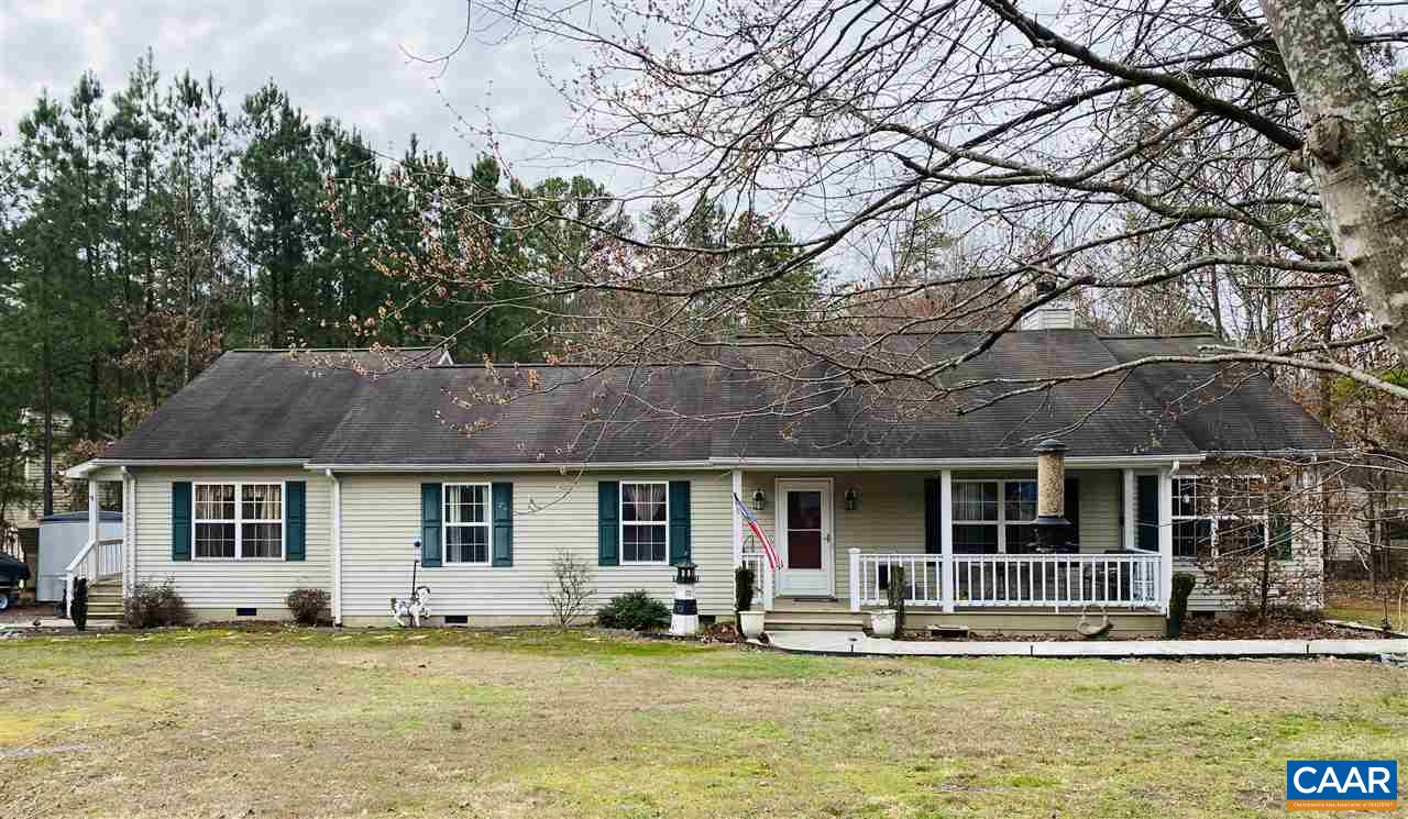 5 Loblolly Road Palmyra, VA 22963 - Photo 1 of 1 a front view of a house with a garden and trees