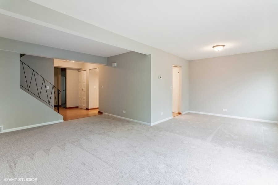 502 Jordan Way Bolingbrook, IL 60440 - Photo 2 of 10 a view of an empty room with stairs