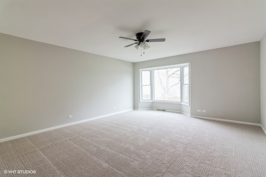 502 Jordan Way Bolingbrook, IL 60440 - Photo 6 of 10 a view of an empty room with a window