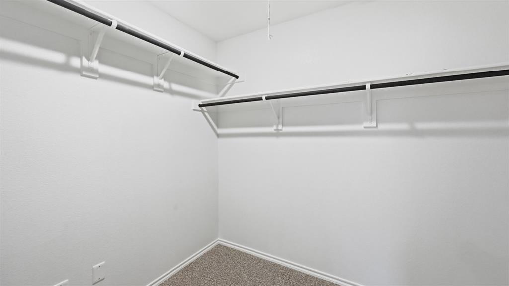 1632 Tin Roof Road Krum, TX 76249 - Photo 20 of 34 a view of an empty walk in closet