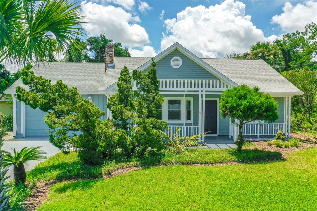 85 Fortune Lane Palm Coast, FL 32137 - Photo 1 of 1 a front view of a house with a yard