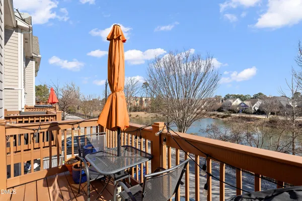 a view of a balcony with furniture