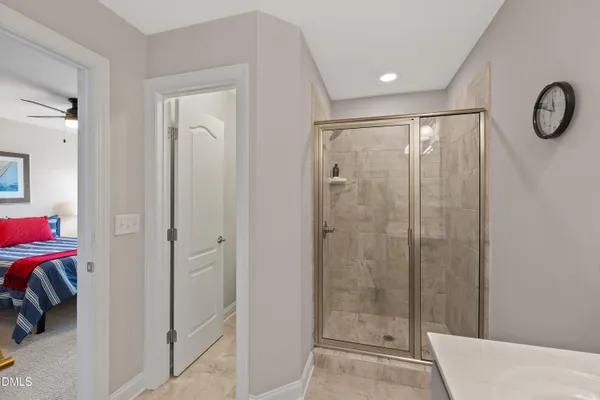 a view of storage and utility room with washer and dryer
