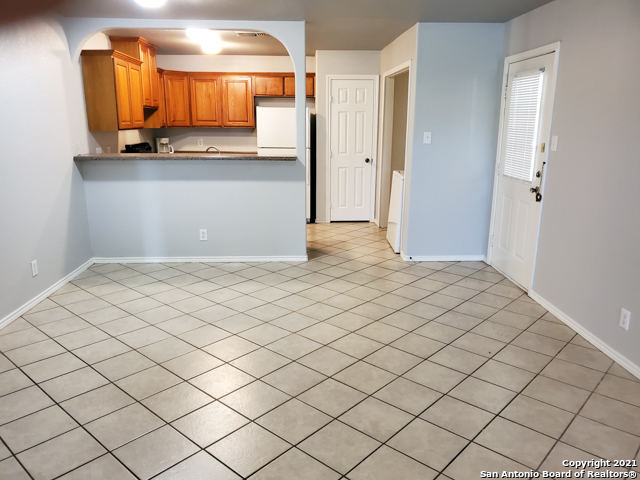 a view of a kitchen with a sink