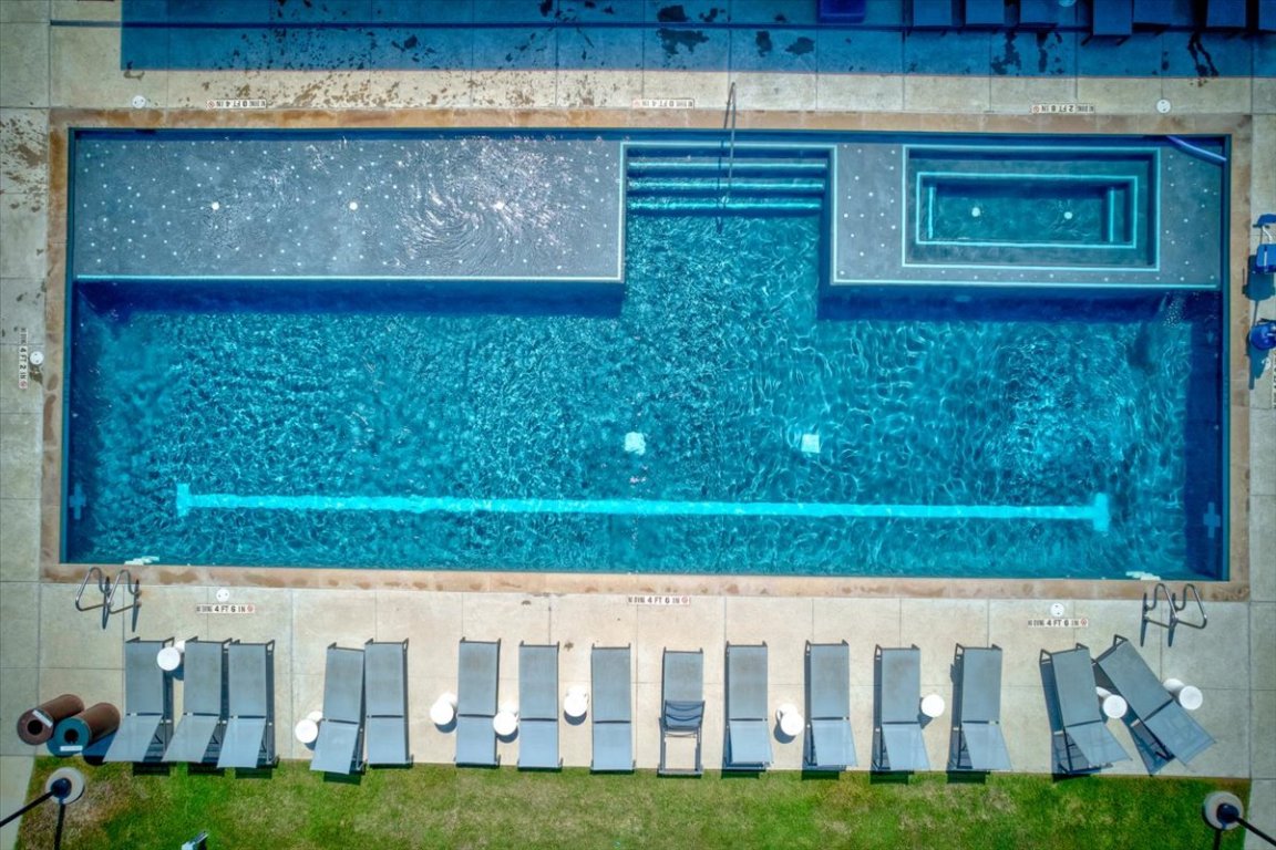 9015 Cattle Baron Path, Unit 1303 Austin, TX 78747 - Photo 26 of 29 a view of a wooden fence