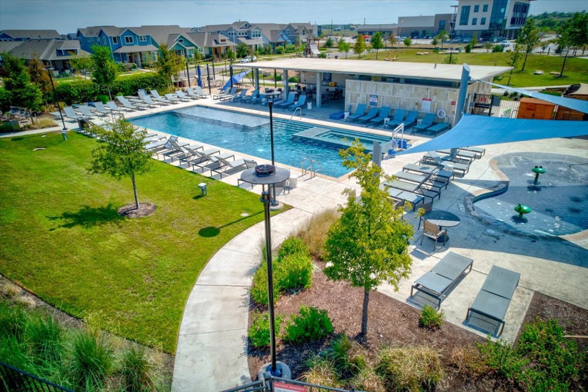 9015 Cattle Baron Path, Unit 1303 Austin, TX 78747 - Photo 27 of 29 an aerial view of a house with outdoor space