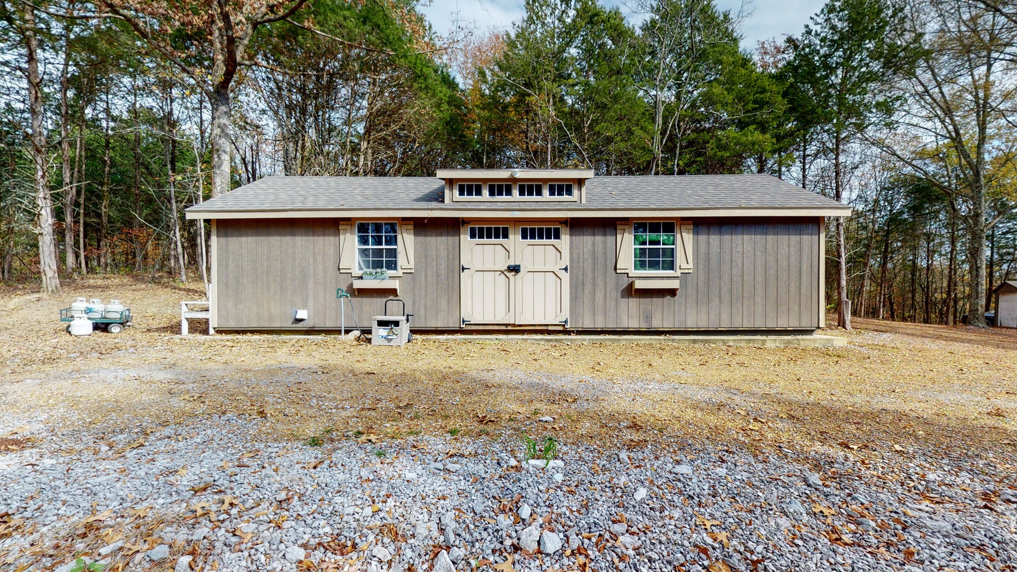 453 Berea Church Road Lebanon, TN 37087 - Photo 23 of 43 a front view of a house with a yard and garage