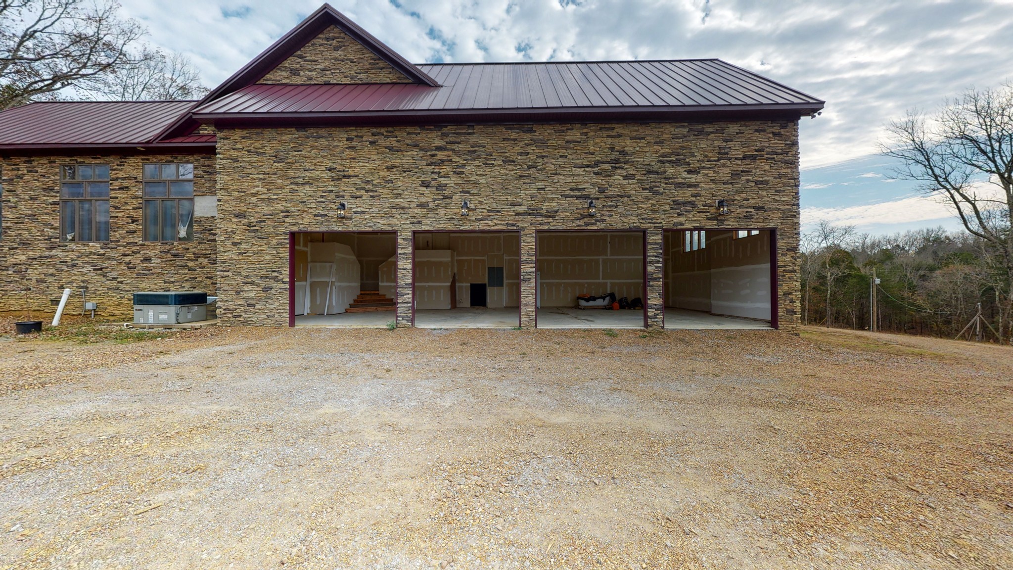 453 Berea Church Road Lebanon, TN 37087 - Photo 4 of 43 a view of a house with a yard and garage