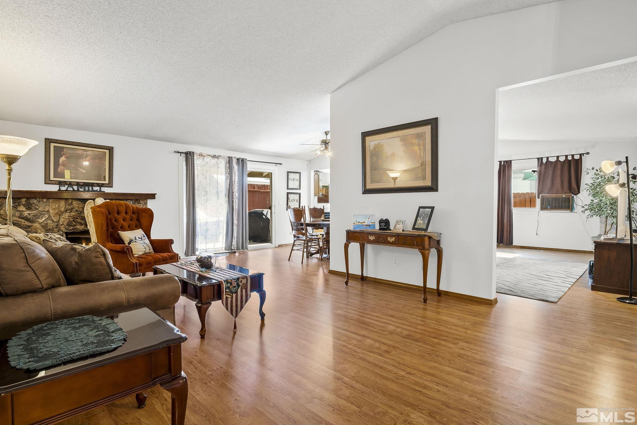 1608 Del Rosa Way Sparks, NV 89434 - Photo 5 of 18 a living room with furniture and wooden floor