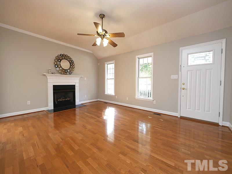 4201 Archibald Way Raleigh, NC 27616 - Photo 6 of 24 Living room offer Fireplace Sellers Never Used and Engineered Floors