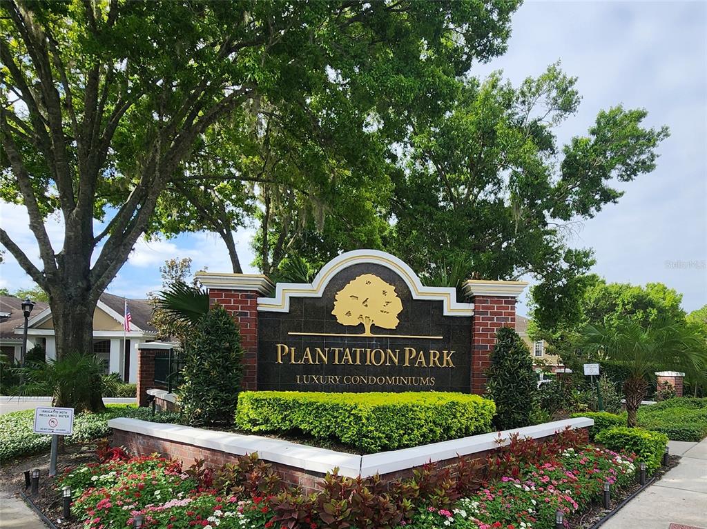 13015 Plantation Park Circle, Unit 1036 Orlando, FL 32821 - Photo 1 of 1 a view of a sign in a park