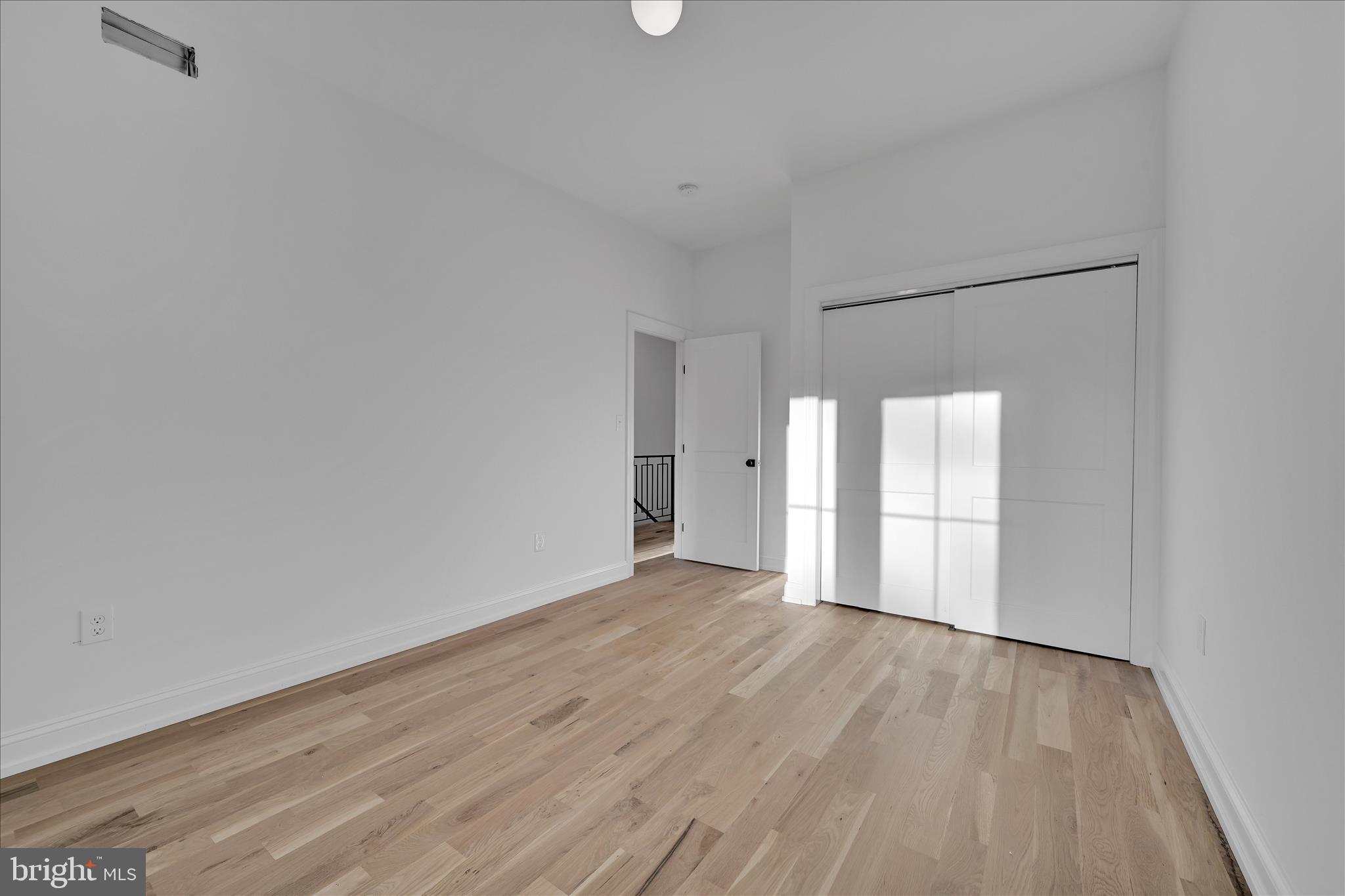 64 East Spring Avenue Ardmore, PA 19003 - Photo 15 of 26 a view of a big room with wooden floor and windows