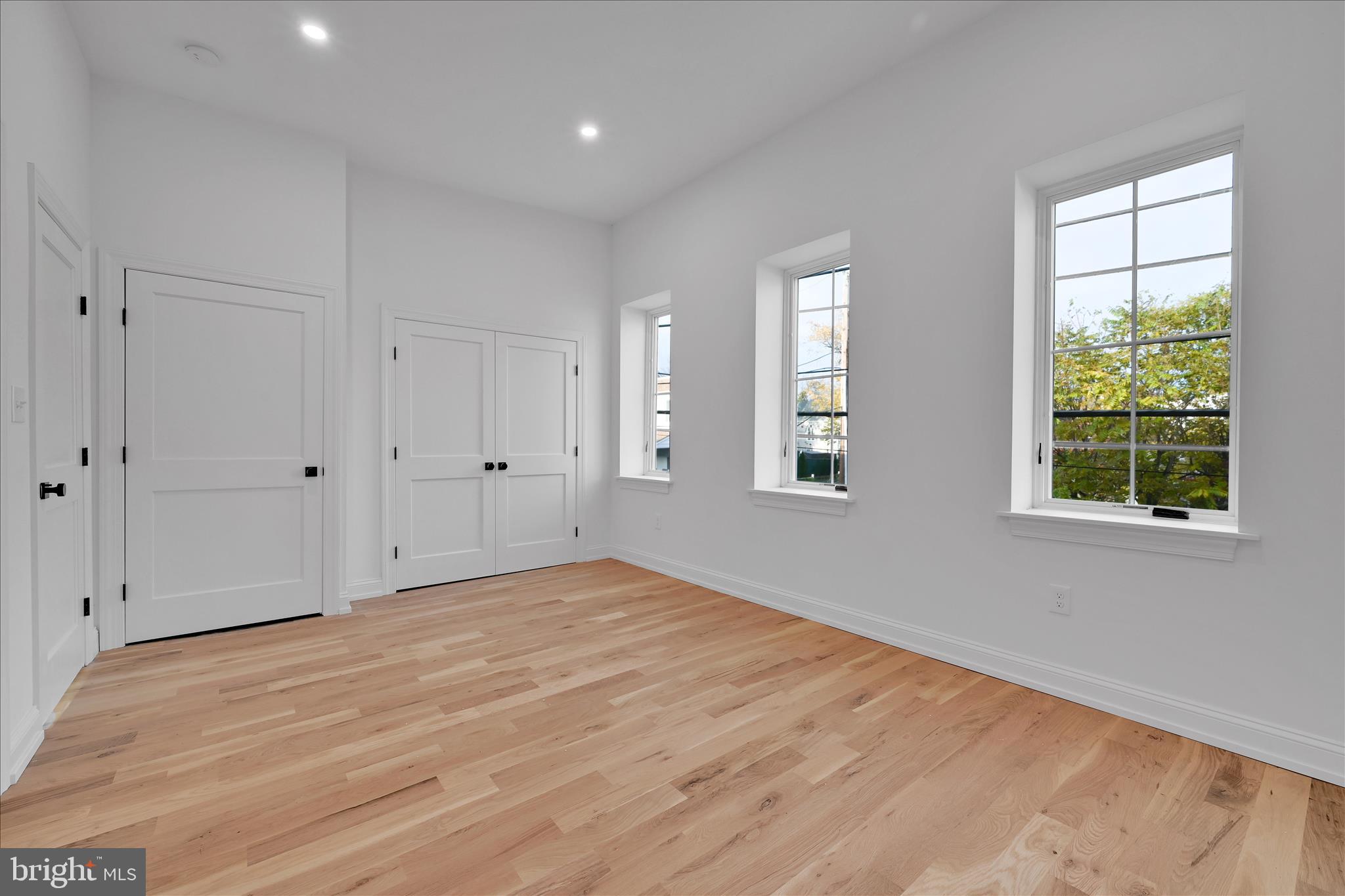 64 East Spring Avenue Ardmore, PA 19003 - Photo 21 of 26 a view of empty room with wooden floor and fan