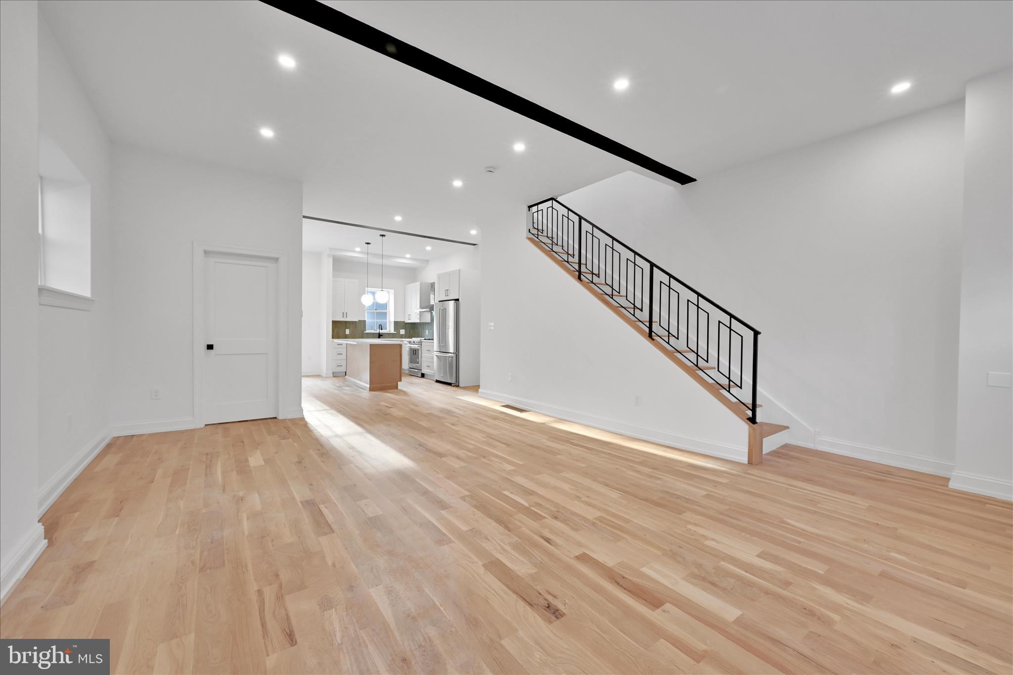 64 East Spring Avenue Ardmore, PA 19003 - Photo 3 of 26 a view of empty room with wooden floor