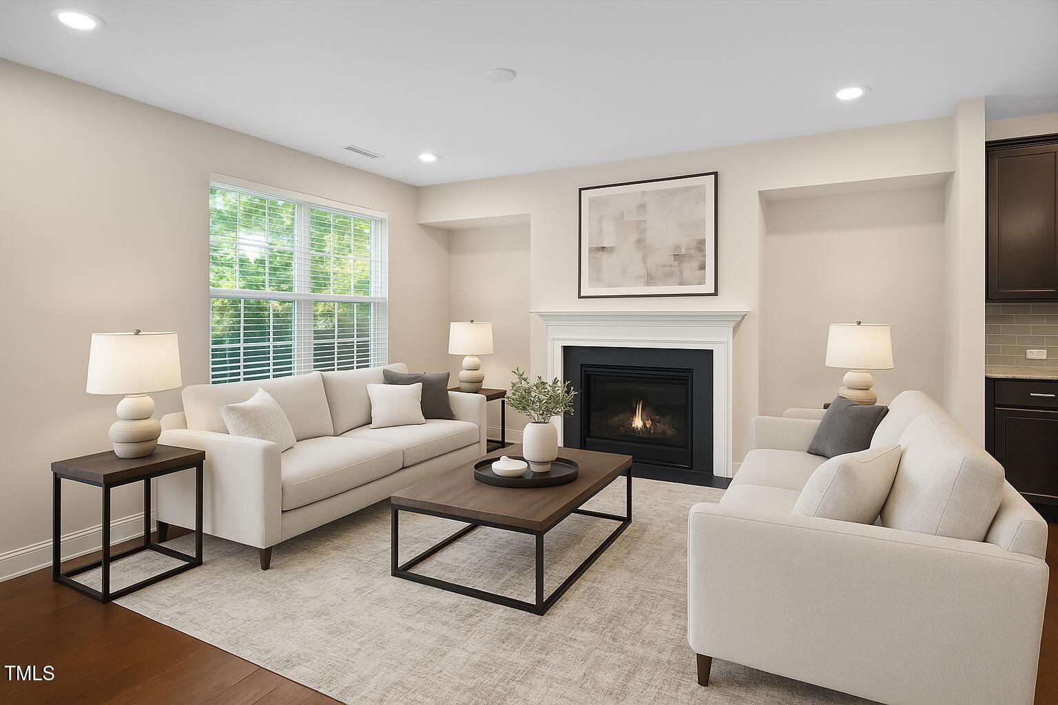 1103 Laurel Twist Road Cary, NC 27513 - Photo 10 of 38 a living room with furniture and a fireplace