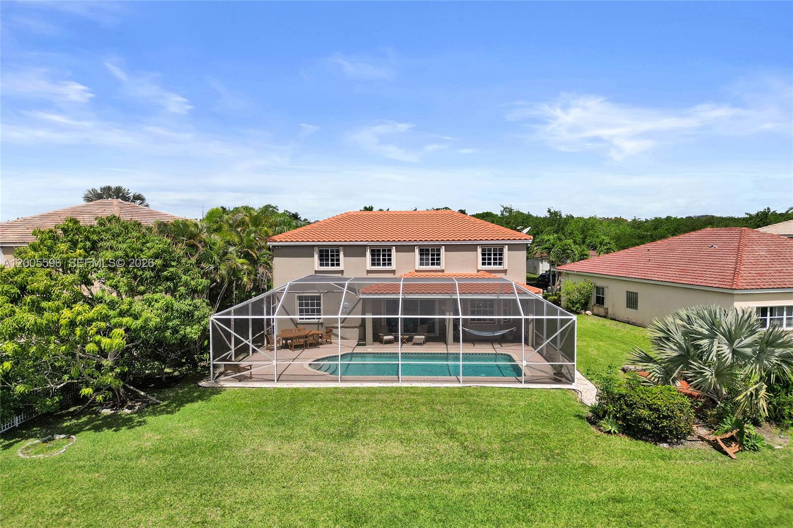 4281 Laurel Ridge Circle Weston, FL 33331 - Photo 12 of 80 a front view of a house with a yard