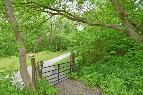 a view of a bench in a garden