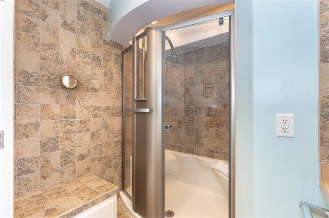 a picture of a bathroom with a sink and a mirror