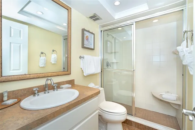 a kitchen with a sink cabinets and a window
