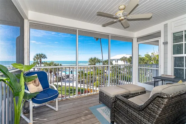 a view of balcony with furniture