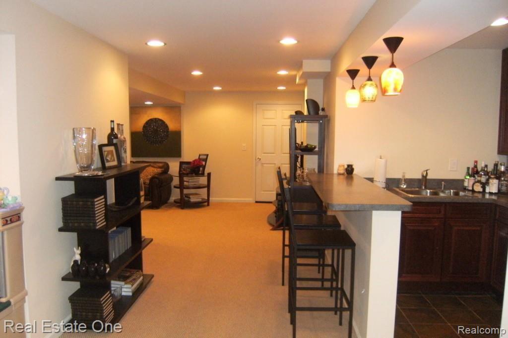 3133 East Maple Road Wixom, MI 48393 - Photo 24 of 37 Entrance to Professionally Finished Lower Level