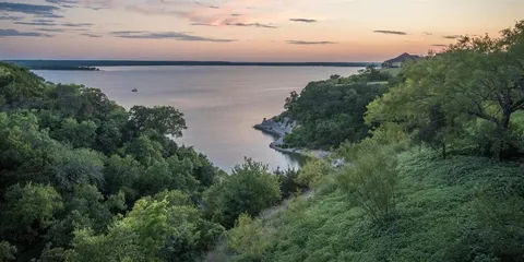 a view of a lake and mountain in the back