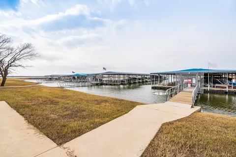 a view of swimming pool with outdoor seating