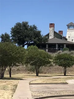 a view of road with houses