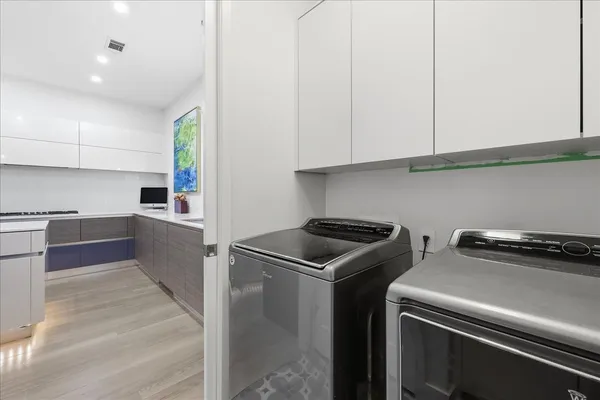 a kitchen that has a sink and a stove